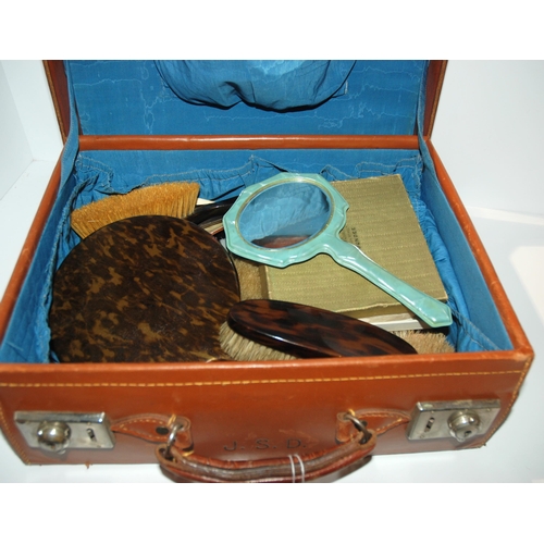 411 - A cased of various brushes, compacts etc