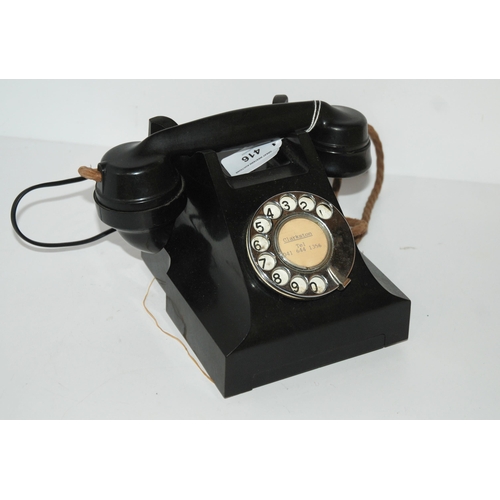 416 - A vintage black Bakelite telephone