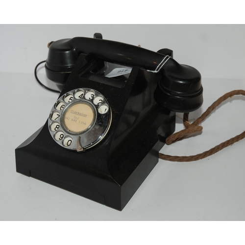 416 - A vintage black Bakelite telephone