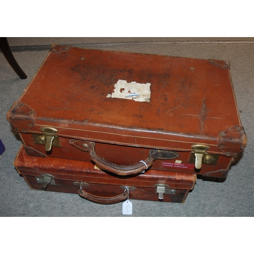 419 - Two vintage leather suitcases, 60cm wide and smaller (2)