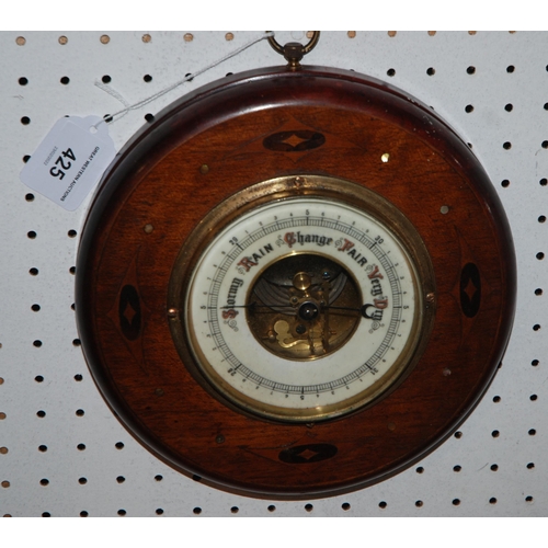 425 - An Edwardian inlaid circular barometer, 20cm diameter 