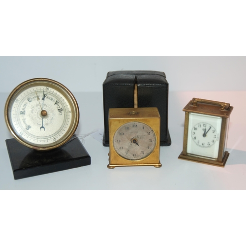 431 - A miniature travel alarm clock in fitted case, 5cm wide (af), a miniature carriage clock and a desk ... 