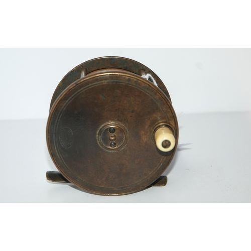 435 - An early Hardy Bros brass reel, 9.5cm diameter, stamped Hardy Bros, Makers, Alnwick