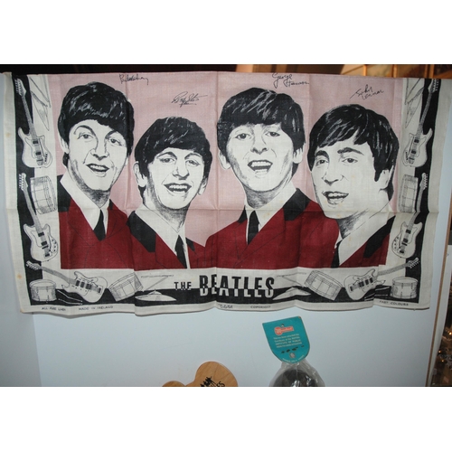 463 - A tray lot of Beatles memorabilia including Rosebud Paul McCartney doll in original packaging, tea t... 