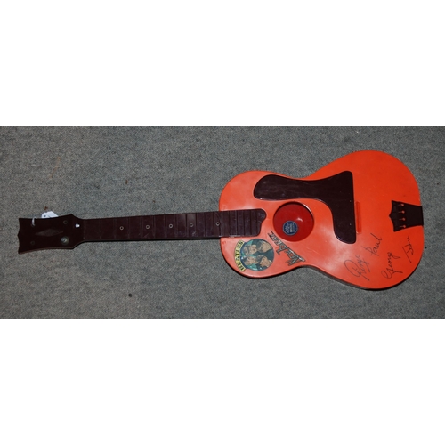 464 - A Beatles New Beat guitar by, Selcol, damaged and repaired, Beatles jigsaw, scrapbooks etc