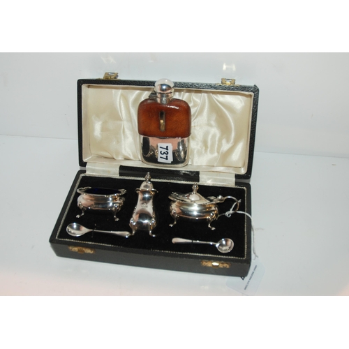 737 - A cased three-piece silver condiment set, Birmingham 1967 & 1968 with a white-metal and leather ... 