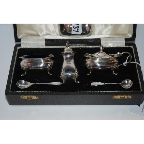 737 - A cased three-piece silver condiment set, Birmingham 1967 & 1968 with a white-metal and leather ... 