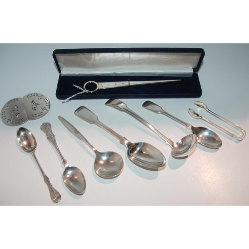 740 - A cased sterling silver meat skewer, 17cm long, a silver dessert spoon, Exeter 1851, a white-metal s... 