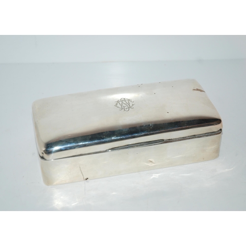 751 - A silver cigarette box, Chester 1916, monogrammed 