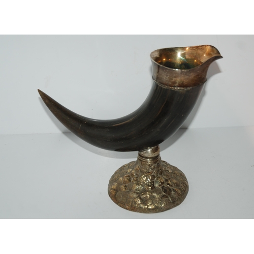 760 - A silver-mounted horn trophy, Birmingham marks, the base with shield plaque, inscribed 