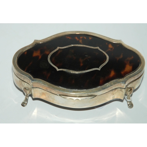 764 - A silver jewellery box with hinged tortoiseshell inset cover, rubbed marks, 11.5cm wide