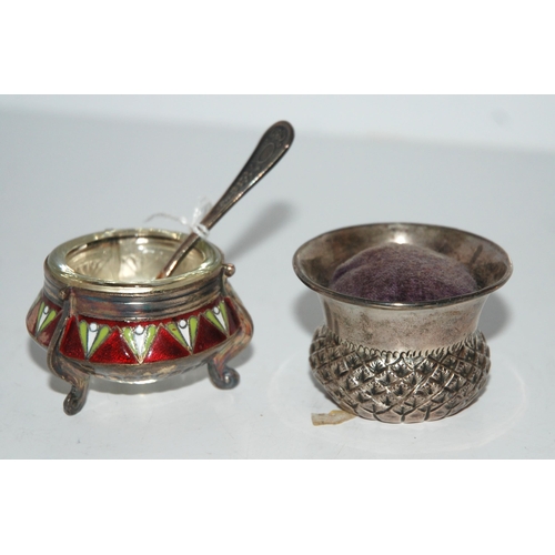 767 - A novelty silver pin cushion, a thistle head and a gilt-metal and enamel salt