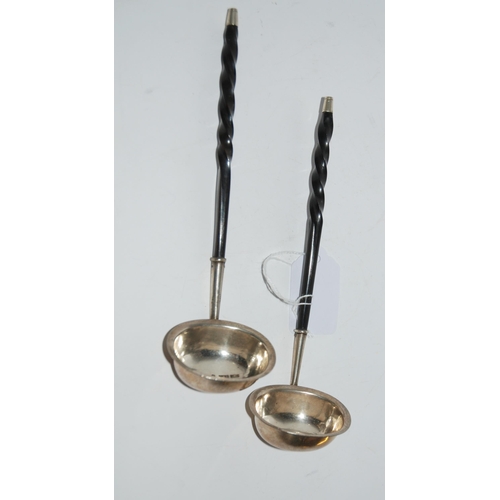 769 - A pair of Scottish provincial silver and whalebone toddy ladles by Rettie, Middleton & Son, Aber... 