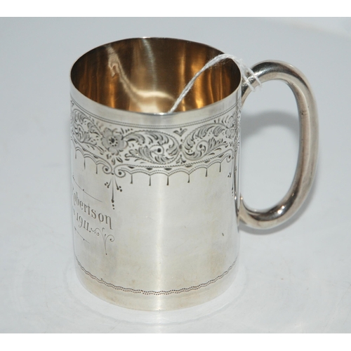 776 - A silver christening mug, Sheffield 1909 with engraved foliate decoration and inscribed 