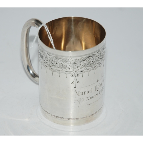 776 - A silver christening mug, Sheffield 1909 with engraved foliate decoration and inscribed 