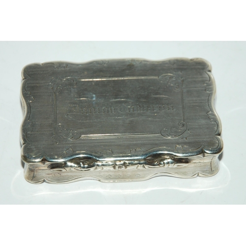 782 - A Victorian silver snuff box, Birmingham 1856, rectangular with engine turned decoration and cartouc... 