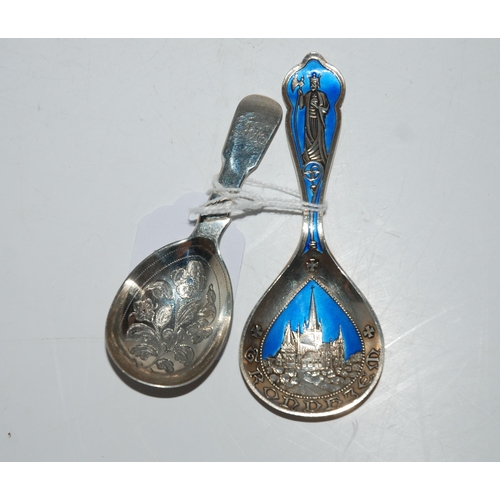 783 - Two silver caddy spoons, one with enamel decoration, marked 925, 10.5cm long, the other London 1803 ... 