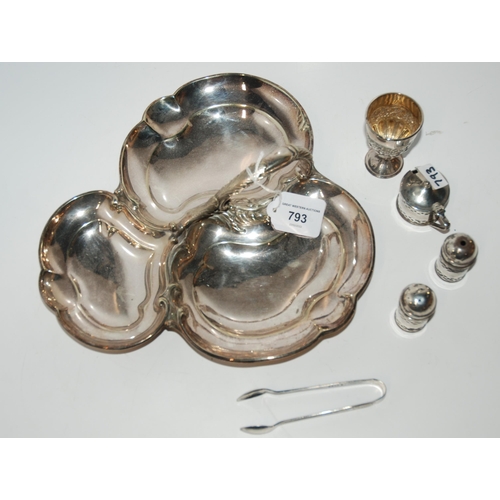 793 - A lot comprising an EP trefoil dish, a silver egg cup, silver condiments and EP tongs