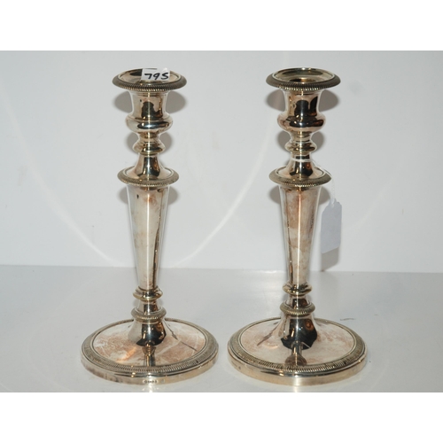 795 - A pair of silver-plated candlesticks, 26cm high