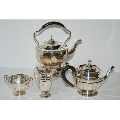 799 - A four-piece EP tea service including a kettle on stand