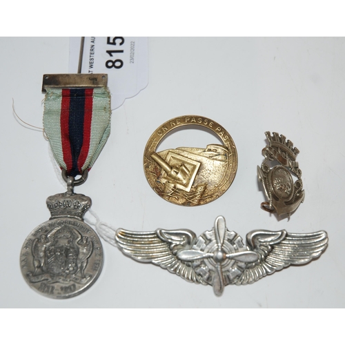 815 - A lot comprising a sterling silver Pilot's badge marked N S Meyer Inc. New York, a Duke of Connaught... 