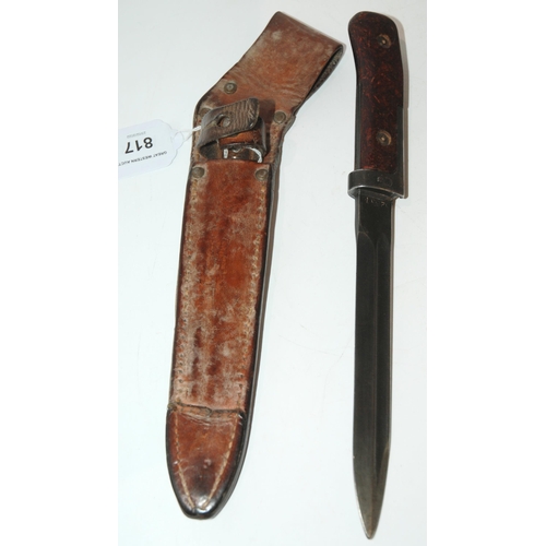 817 - A bayonet/fighting knife in leather scabbard 29 cm o/all length