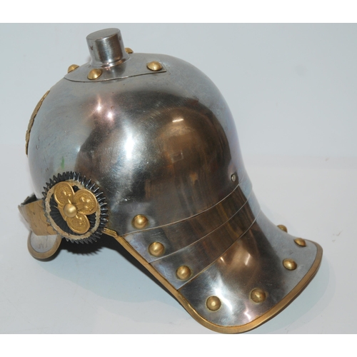 820 - A replica German lobster tail steel helmet