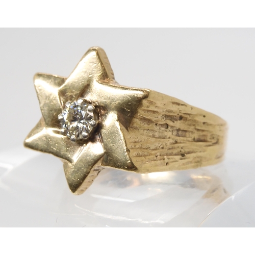 630 - A Star shaped gents ring set with an estimated approx 0.40ct brilliant cut diamond, finger size Y1/2... 