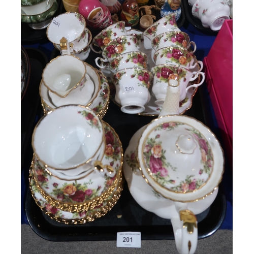 201 - A Royal Albert Old Country Roses tea service comprising tea pot, 12 cups, 12 saucers, 10 plates, a s... 