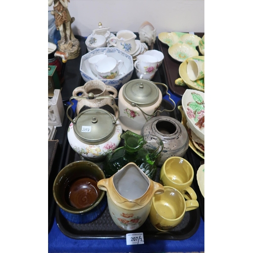 207 - A lot comprising a Mary Gregory green glass ewer, EPNS topped biscuit barrels, floral cups and sauce... 