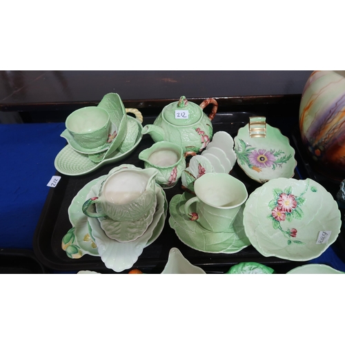 212 - A quantity of Carltonware, including green buttercup patternwares, press moulded tea pots and cups, ... 