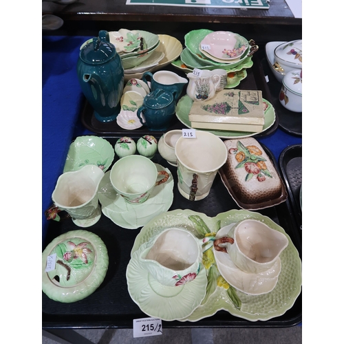 215 - A quantity of Carltonware including green press moulded trinket dishes, plates, cups and saucers, ye... 