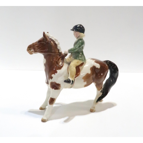 225 - A Beswick Horse and Child Jockey figure