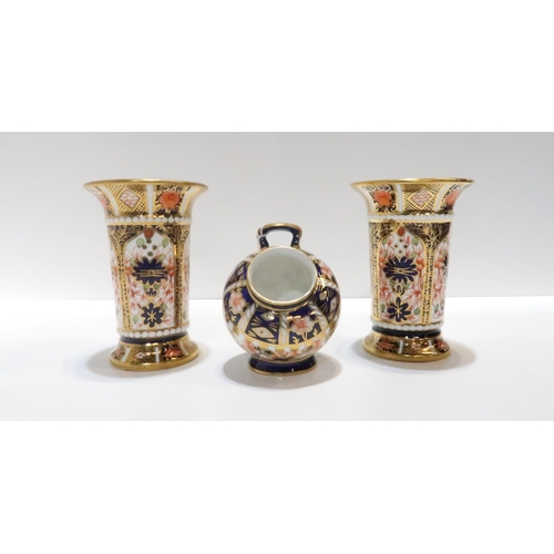 226 - A pair of Royal Crown Derby Imari trumpet vases, date cipher for 1930, and a spill vase, date cipher... 