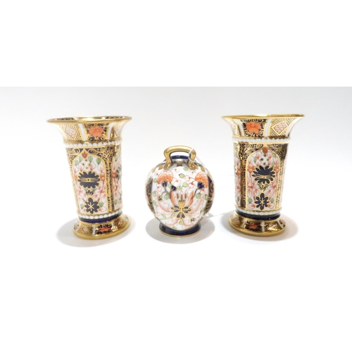 226 - A pair of Royal Crown Derby Imari trumpet vases, date cipher for 1930, and a spill vase, date cipher... 