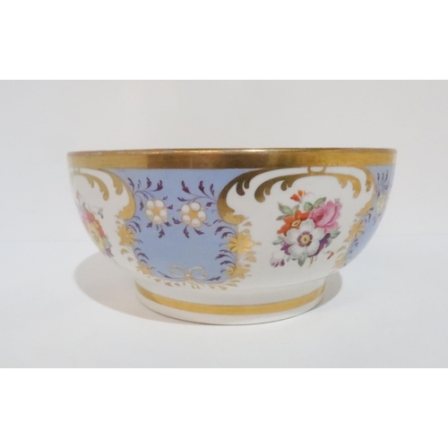 230 - An English porcelain bowl, the pale blue ground gilt decorated and hand painted with  floral sp... 