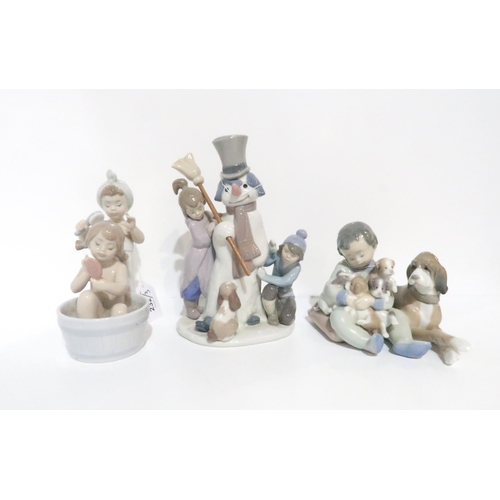 232 - Lladro figure Bathing Beauties 6457, The Snowman 5713, Playmates 5456