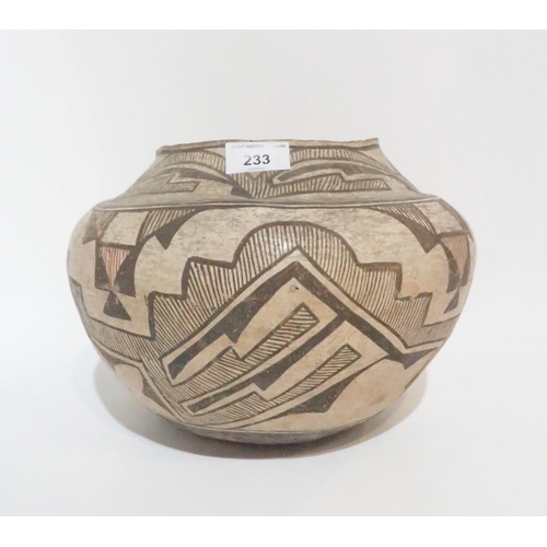 233 - **WITHDRAWN** A Pre-Columbian earthenware bowl, of bulbous form, painted with geometric shapes in bl... 