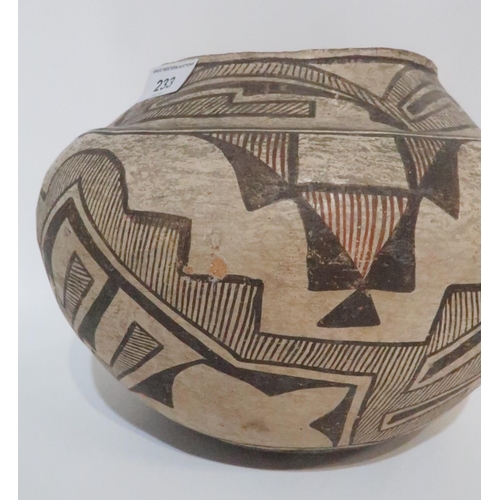 233 - **WITHDRAWN** A Pre-Columbian earthenware bowl, of bulbous form, painted with geometric shapes in bl... 