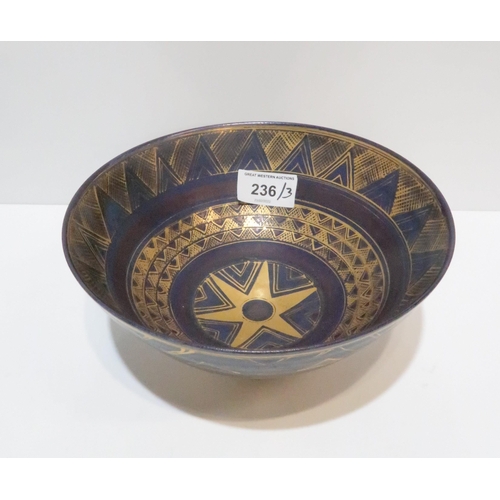 236 - A Mary Rich footed bowl with gilt decorated geometric lines on a dark purple ground, impressed mark ... 