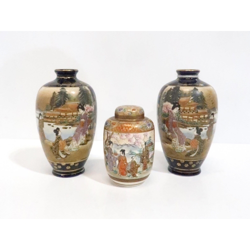 251 - A pair of Satsuma vases and a Satsuma jar and cover