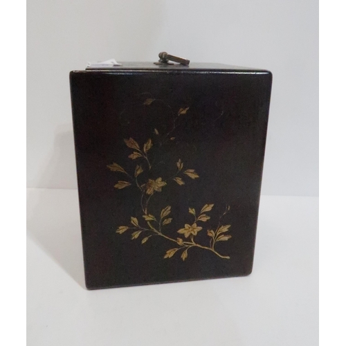 260 - A Japanese gilt lacquered jewellery/trinket box with three inserts, decorated to each side with flow... 