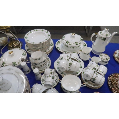 281 - A Hammersley gilt rimmed and vine decorated dinner service comprising tea pot, tureens, serving plat... 