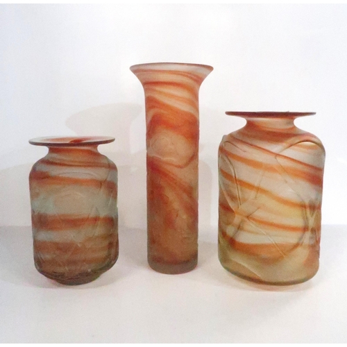 287 - Three Mdina orange and clear glass vases with applied clear ribbon decoration