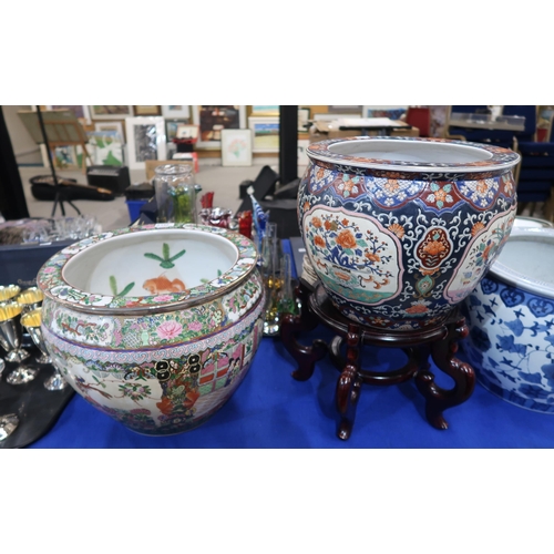 293 - A large Chinese enamelled fish bowl decorated with gilt, and another blue ground example with cartou... 