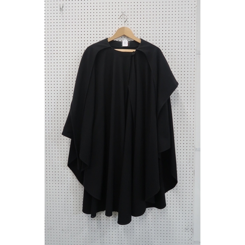 300 - A Molina by Jimmy Hourihan black cashmere walking cape, a black velvet robe, an Escada wool cape coa... 