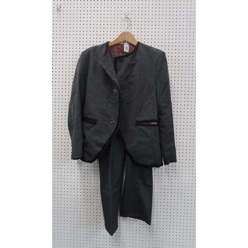 301 - A 1960s grey collarless suit with black ribbing