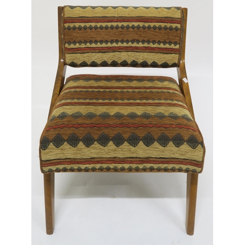 104 - A mid 20th century teak chair after Neil Morris for Morris of Glasgow with kilim style upholstery, 7... 