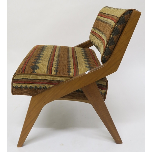 104 - A mid 20th century teak chair after Neil Morris for Morris of Glasgow with kilim style upholstery, 7... 