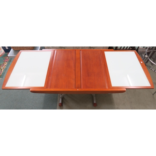 108 - A modern stained teak and glass topped metamorphic dining/coffee table with tambour extending top, 8... 